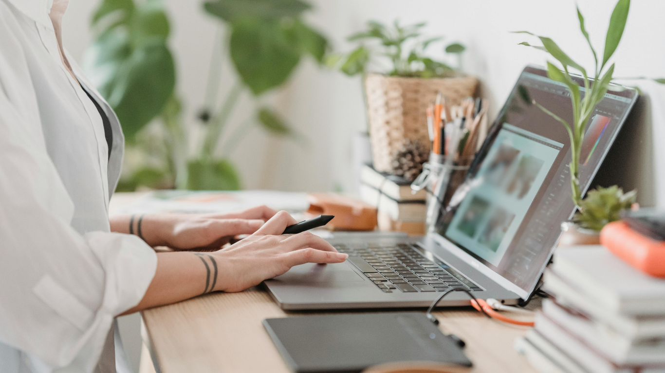 A person creating a job advertisement at their computer.